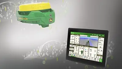 Landwirtschaftliches Gerät vor digitaler Anzeige